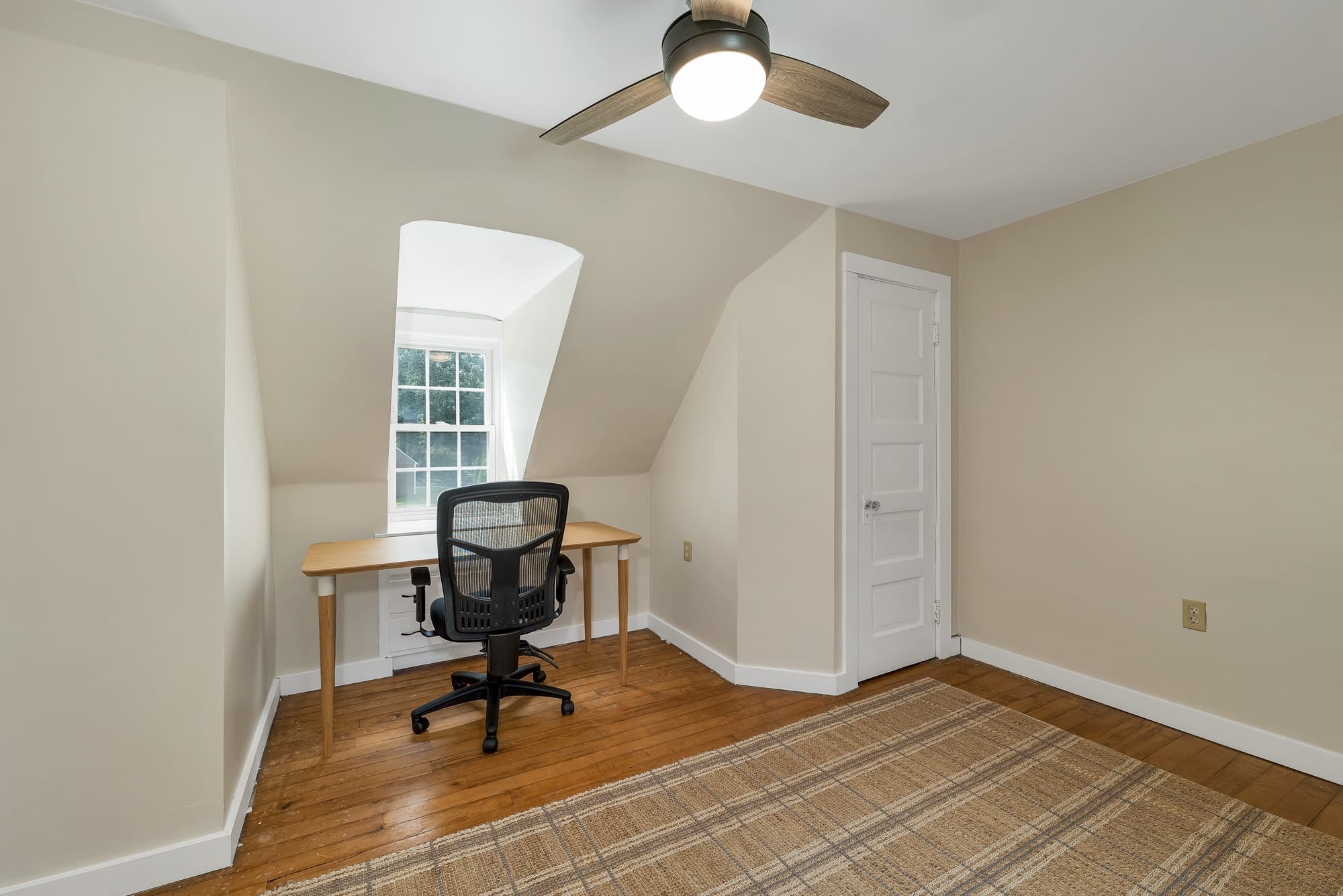 Unit 25 upstairs bonus room with a desk, dormer window, and ceiling fan